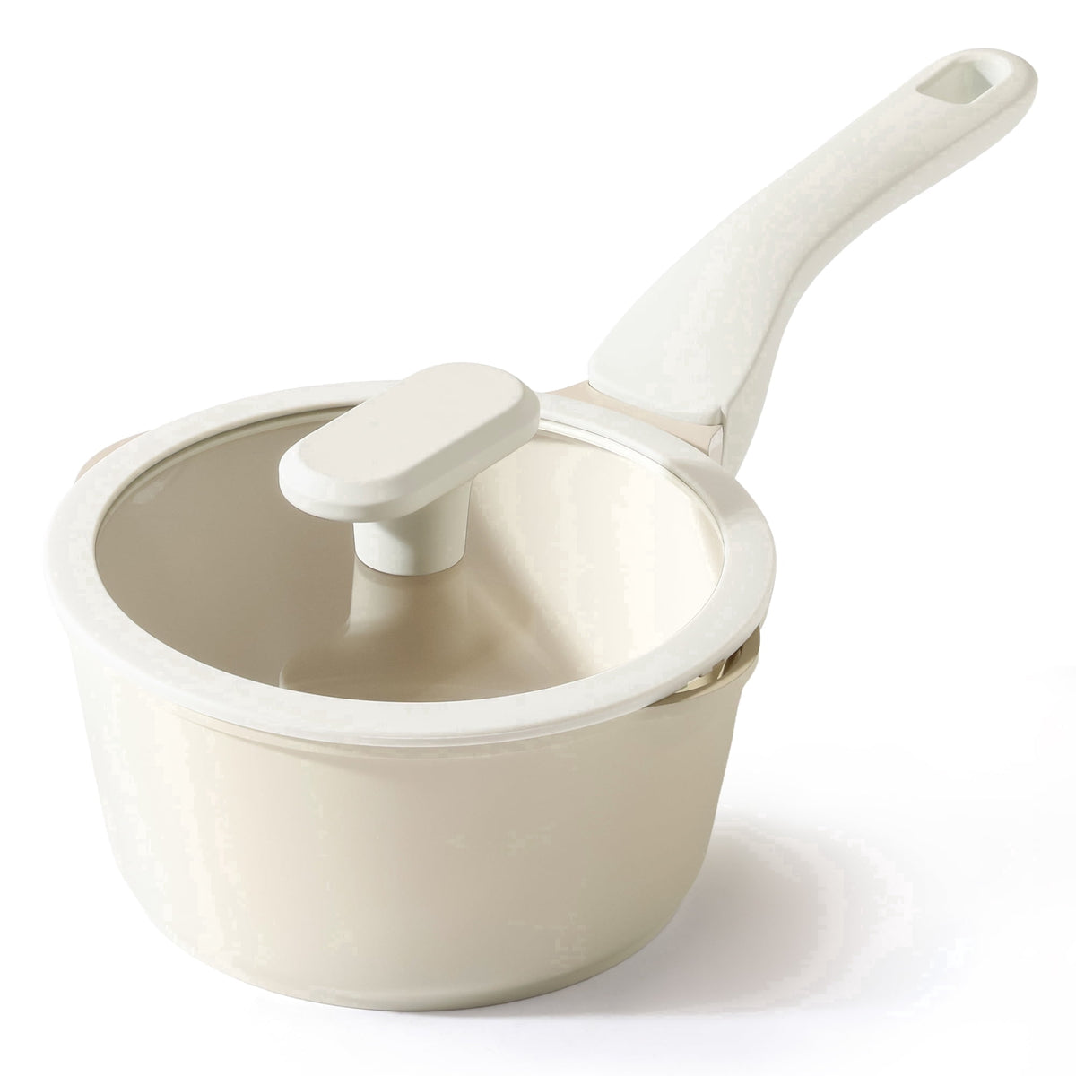 Cream saucepan with a matching handle and a clear lid.