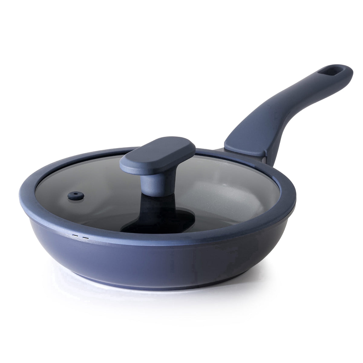 Navy frying pan with a matching handle and a clear lid.