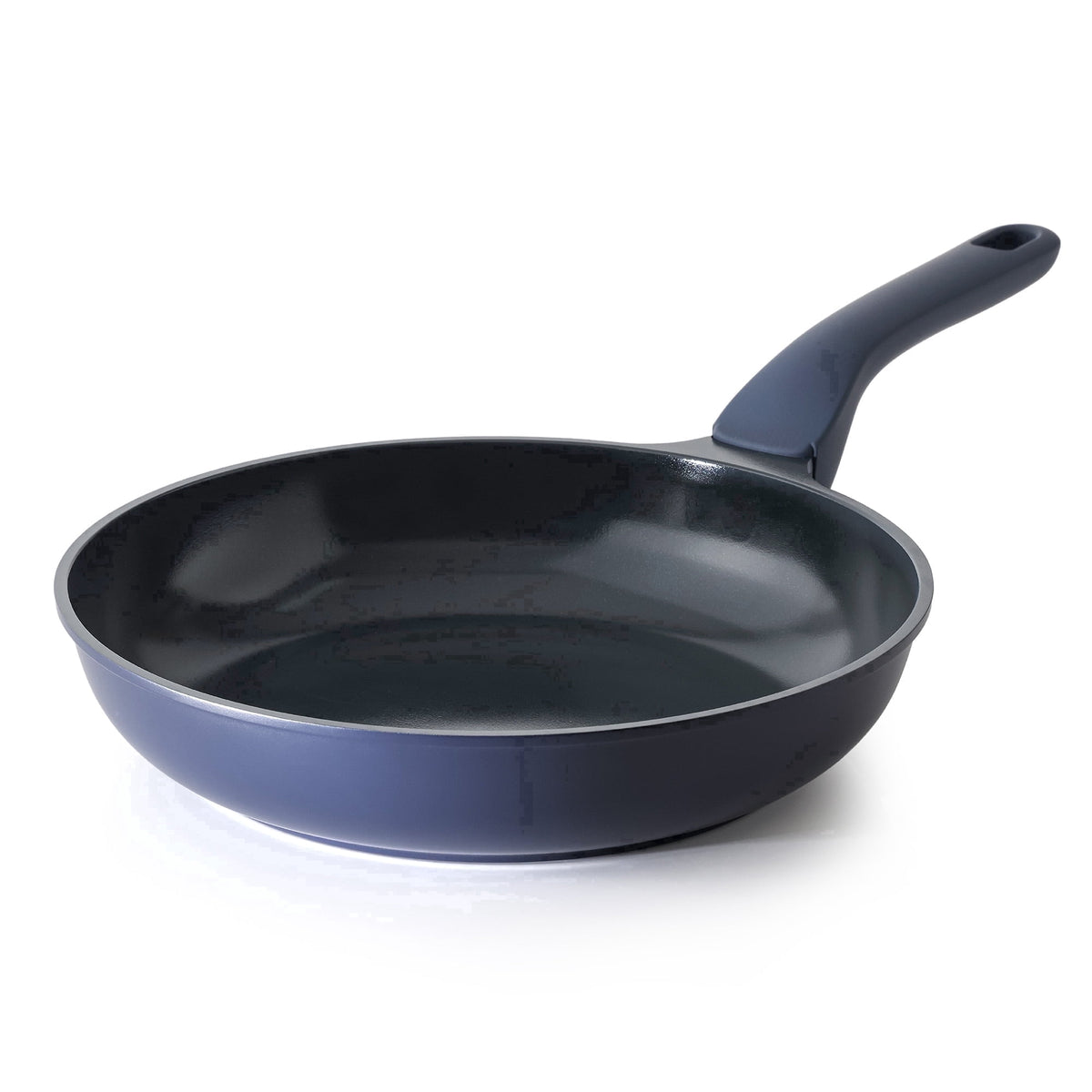 Navy frying pan with a matching handle and dark interior.