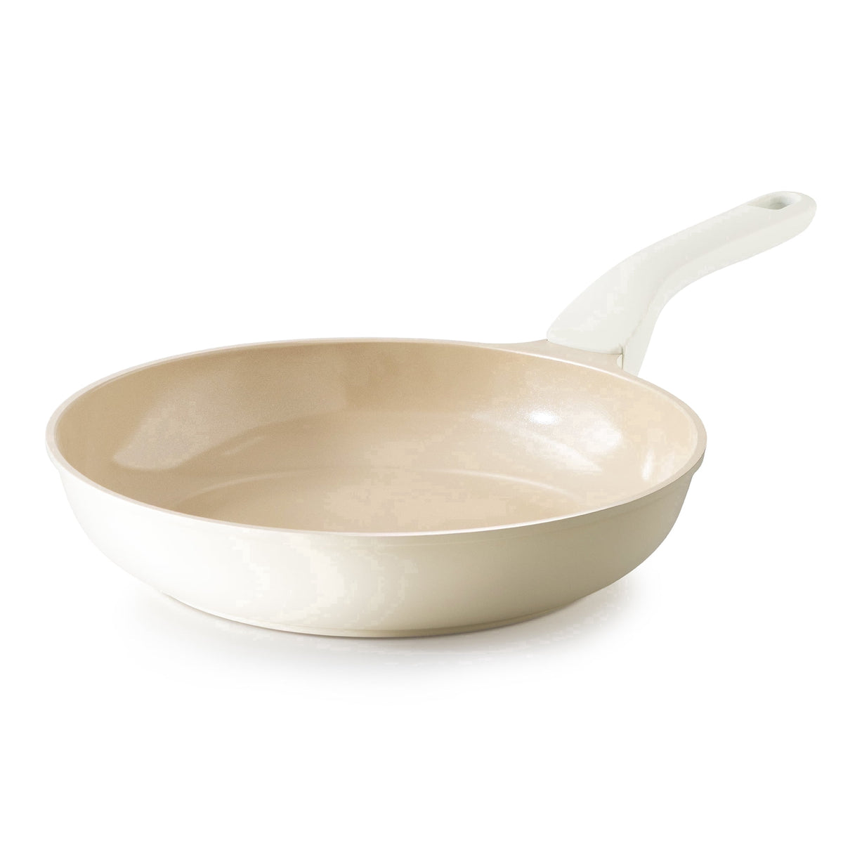 Cream frying pan with a pale handle and light-colored interior.