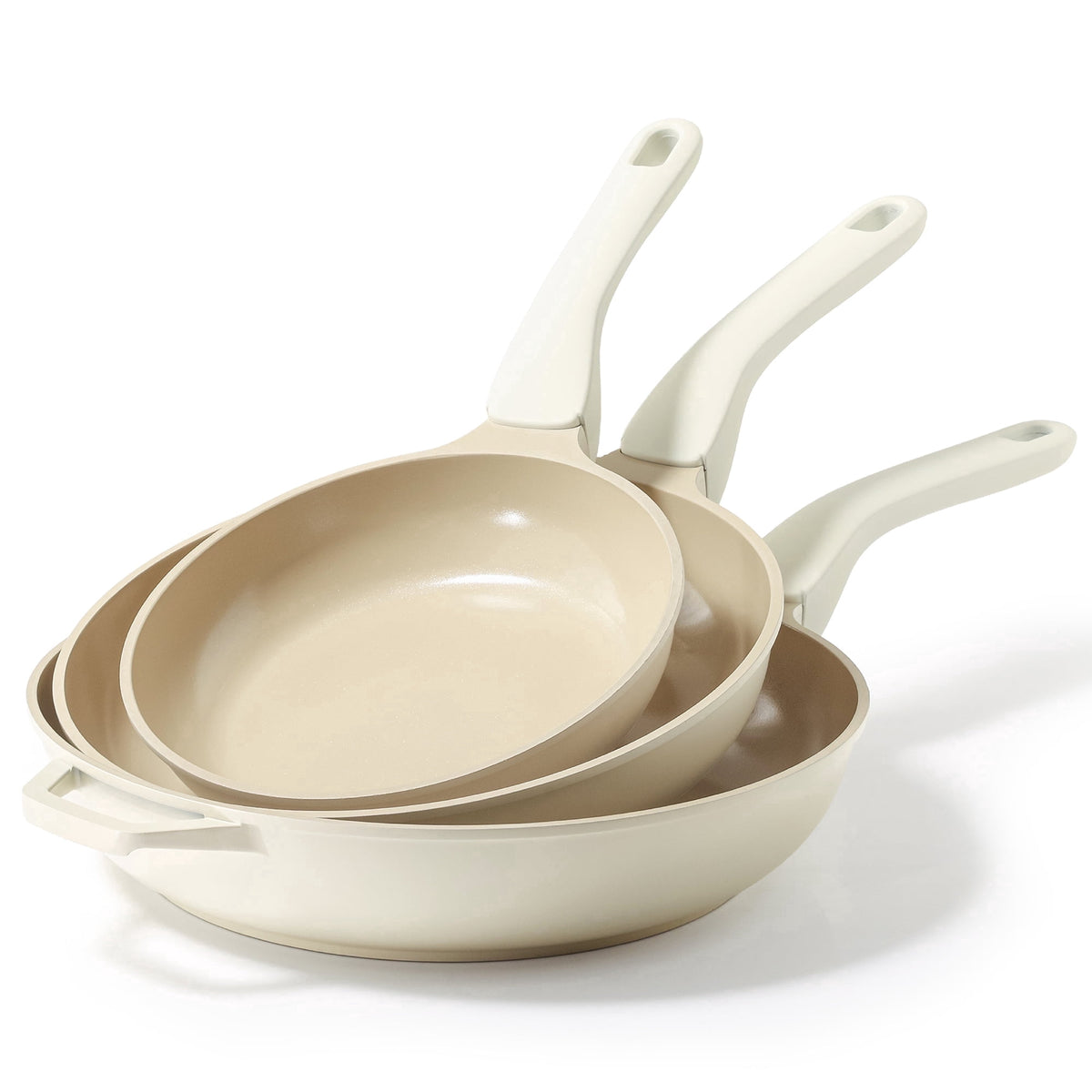 Ivory three frying pans stacked.