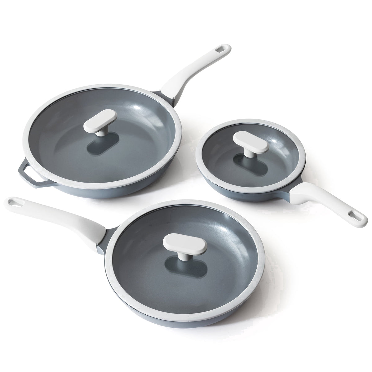 Blue-gray three frying pans with three lids.